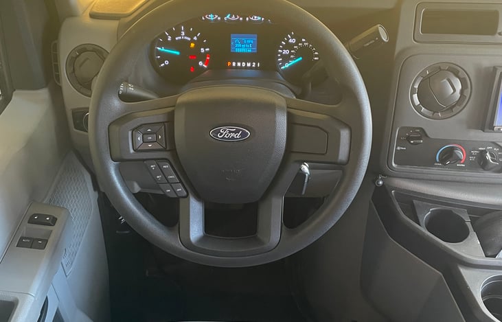 Drivers seat, and low mileage on this rig!