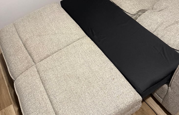 Couch in bunk room turns into a bed