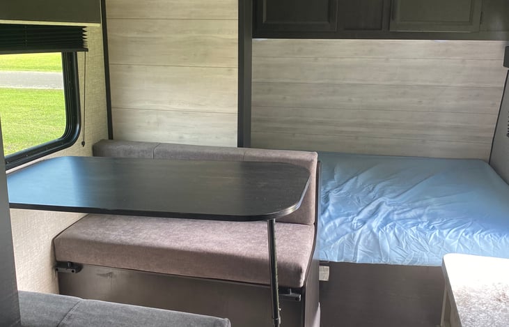 Dining table that converts into a small bed, AND Queen size bed with storage on top