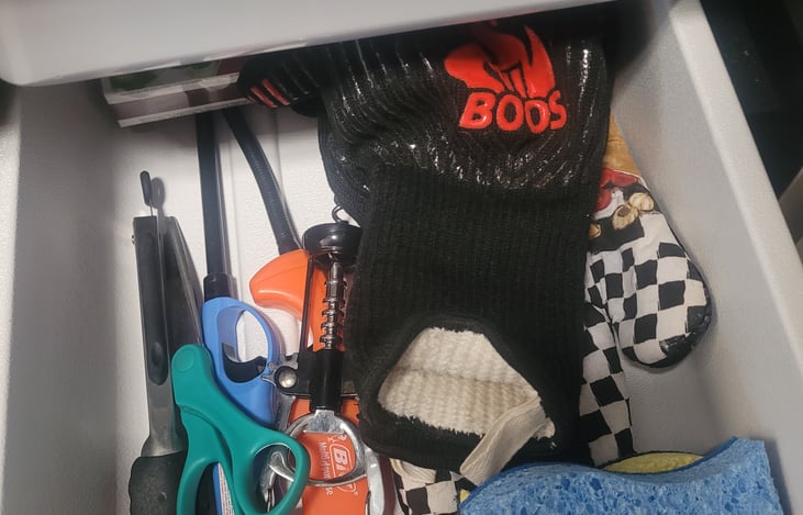 Drawer in kitchen- BBQ gloves, scissors, small tongs, wine opener