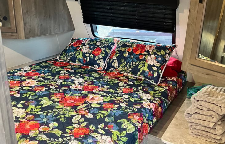 Main bed is a full rv bed. Bedding and linens provided for a $50 fee.