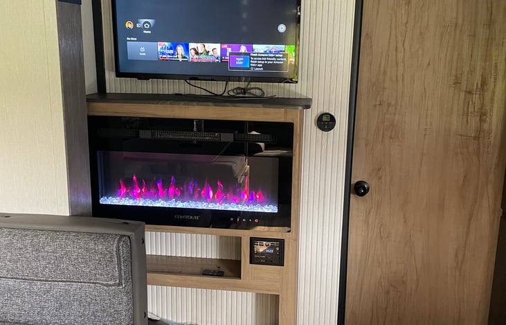 Fireplace acts as space heater , Smart TV !