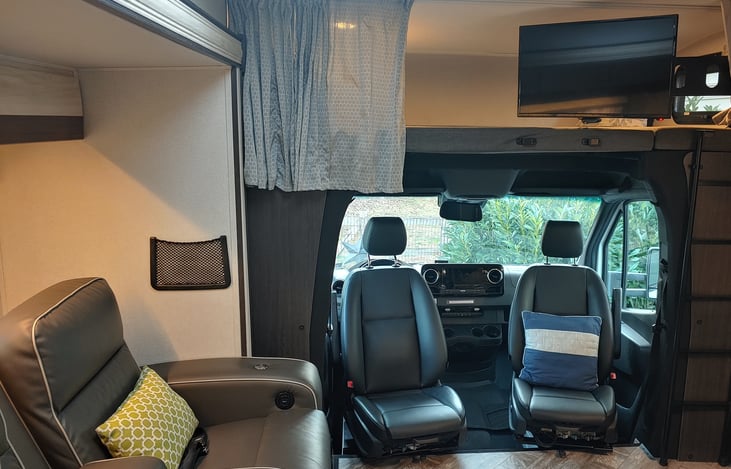 Slide fully open. Chairs swivel to create intimate conversation area.