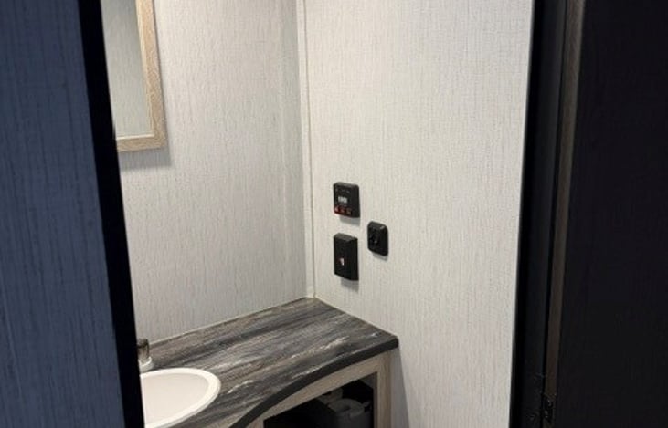 Bathroom. Hand soap and TP provided.