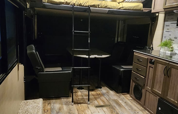 Top bunk is a queen size bed lowered to show bed height.