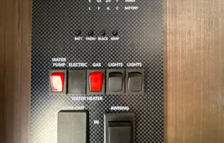 Power switches for water pump, gas, outdoor lights, indoor lights and awning