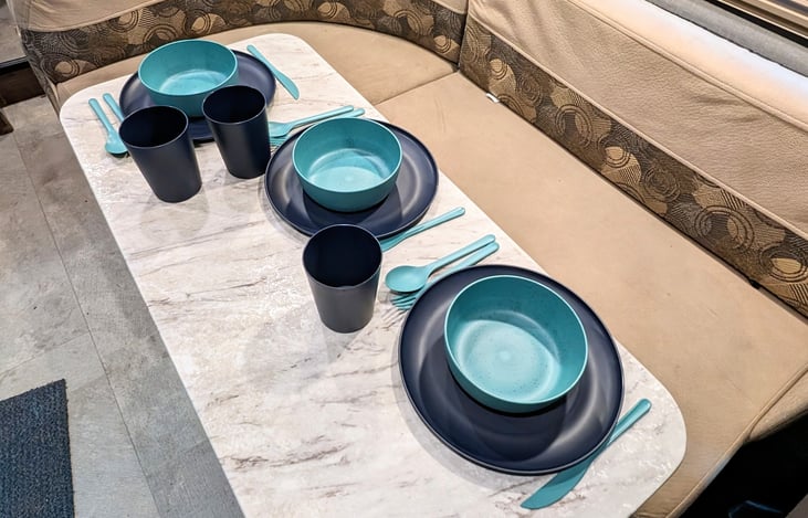 Corner dining arrangement for eating, working or entertaining. Rental includes all kitchen supplies.