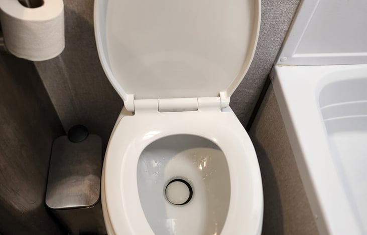 Residential size porcelain toilet