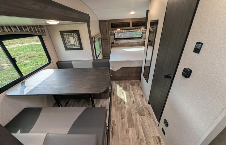 Smart layout featuring a chef’s rear galley and a slide-out dinette with a huge panoramic window. Enjoy great meals, natural light, and scenic views in a surprisingly spacious interior!