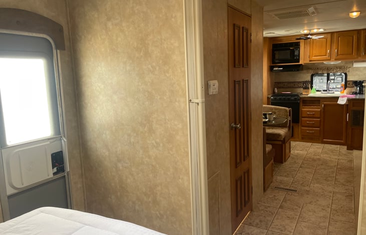 Bedroom has a 2nd entry door with bathroom nearby