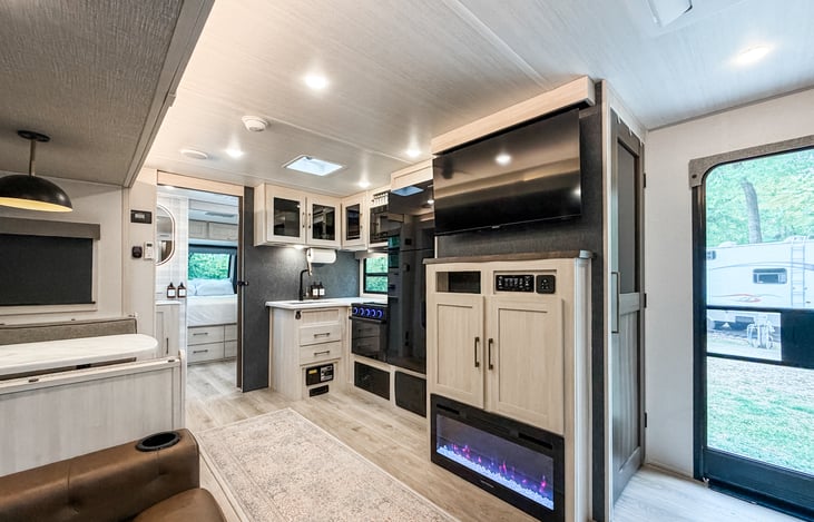 Common area includes living space, dining, and kitchen.