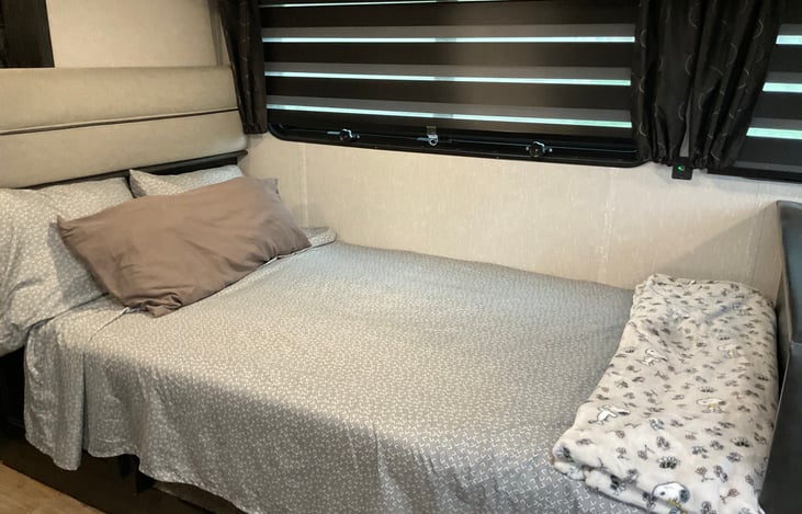 Dinette bed made into sleeping area.