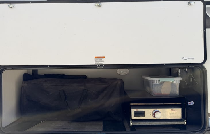 Small outdoor griddle and 3 burner Camp Chef with 2 burner griddle