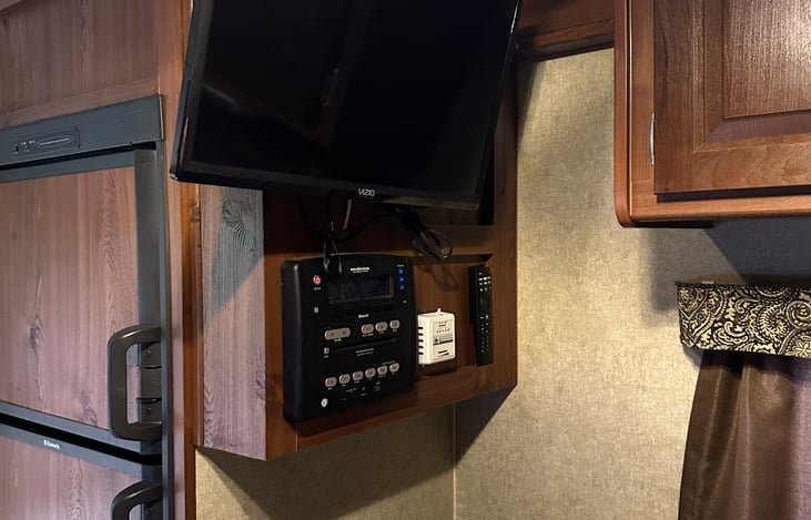Tv and sound system over dinette