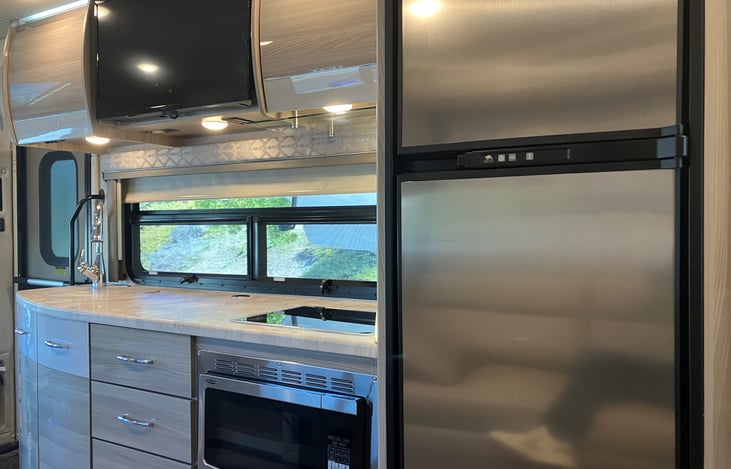 Refrigator and Kitchen window.