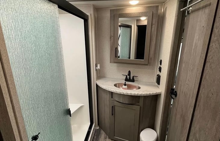 Full bathroom. Shower and sink both drain to one grey water tank.