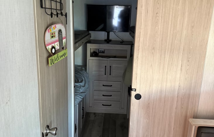 Bunkhouse - Enter if you dare! The kids usually claim this as their own. 3 Full sized bunks, and a small table that also converts to a bed. Storage and a TV.