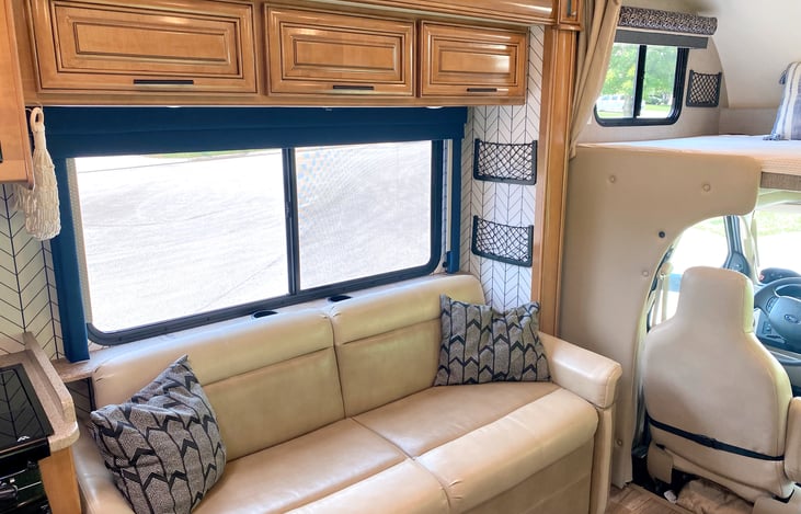 Sofa can fold down as another bed. Ample storage under the sofa.