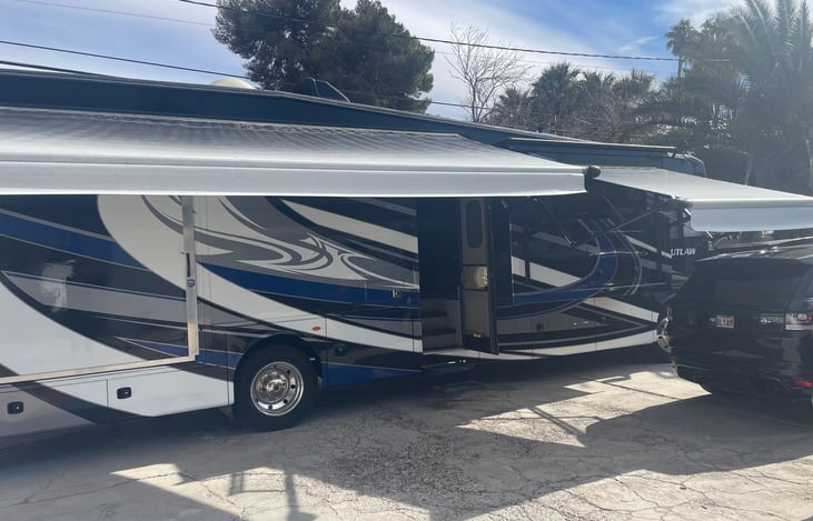 Plenty of shade with both front and rear awnings. (Note the side patio is stowed in this pic)