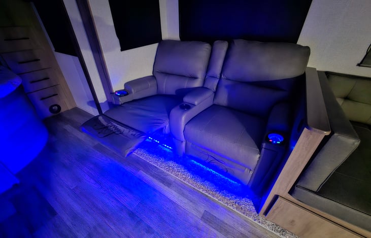 Leather recliners with built-in heating, massage and lighting.
