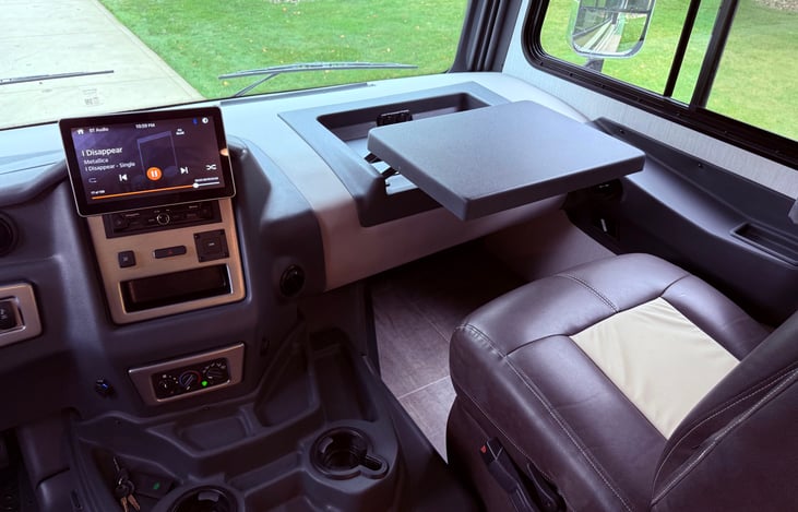 Can Dash Area to include fold passenger computer work station, passenger overhead fan and comfortable captains chair.