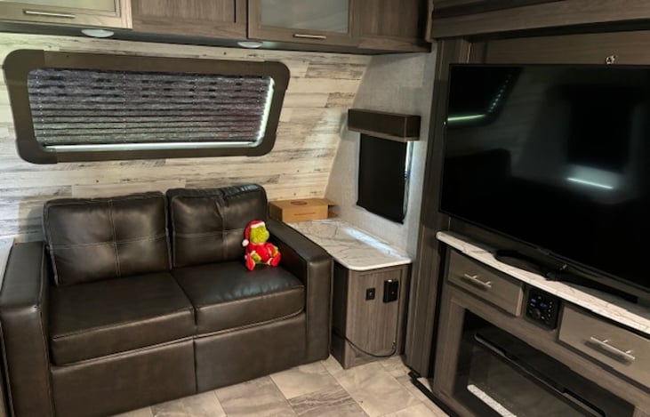 living room tv, fireplace and sofa, sound system