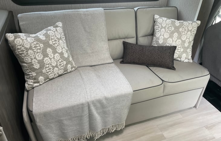 Couch with storage compartment underneath