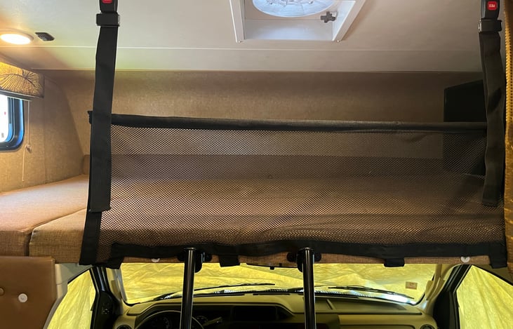 Overhead bunk child safety net