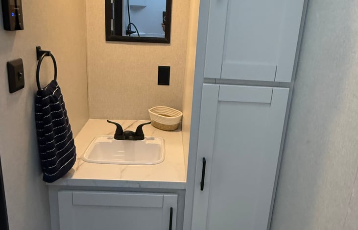 Sink and Linen Closet