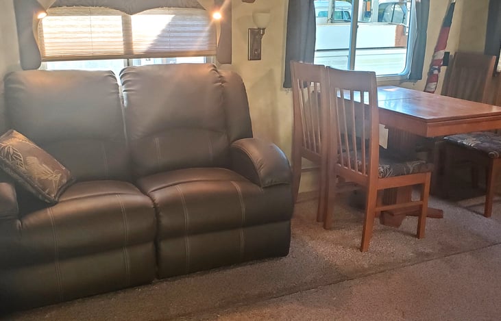 The couch forms a relaxing place to read, watch movies, or listen to the radio.  The seats recline.