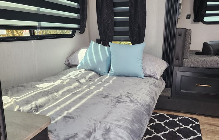 The back couch turns into a cozy bed for 2!