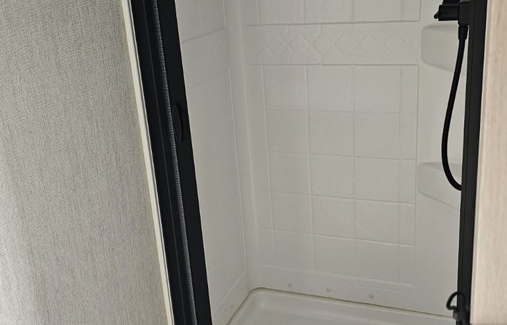 Private shower with modern fixtures