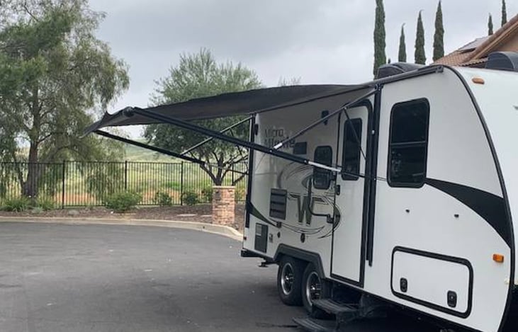 A 15 ft. electric awning extends out for plenty of shade.