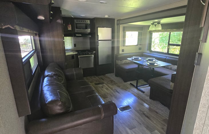 Spacious, open floor plan. Great room. Couch folds out to a queen bed. Best with extra pad.
