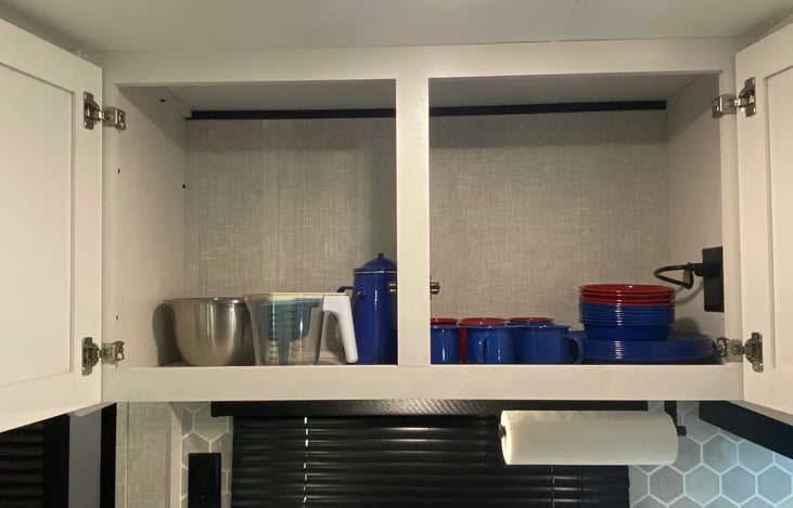 Dishes, percolator, mixing bowls and measuring cup and spoons