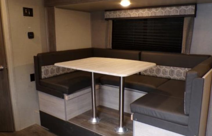 Dinette drops down to a bed.