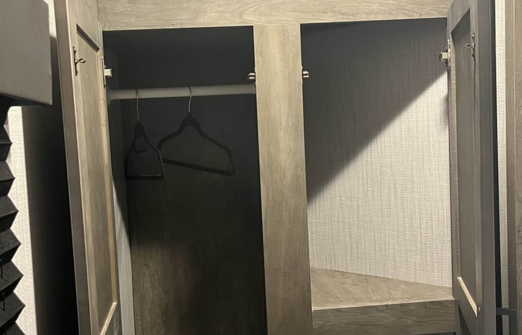 Closet at the end of the bed.