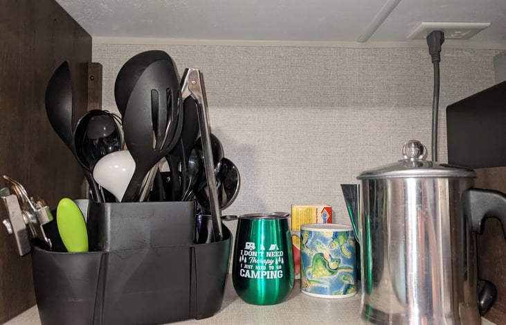 Kitchen utensils provided. Old-fashioned coffee percolator for the cookstove provided.