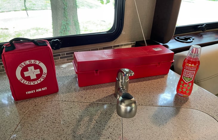 First Aid kit , Triangles, Fire Extinguisher to control 10 types of fire , everything brand new