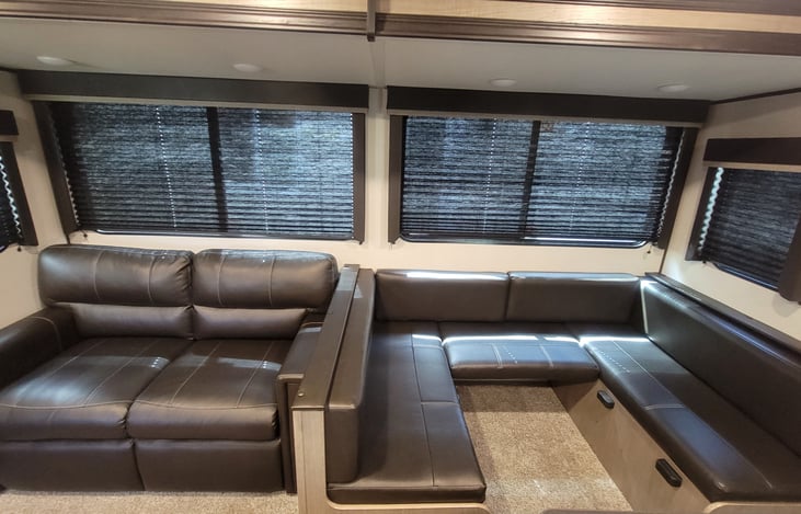 Plenty of seating. Our fur babies love to under that seat. Both turn into a bed. We love that the kitchen table is movable.