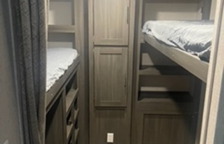 Bunkroom, one twin size and one larger full sized bunk