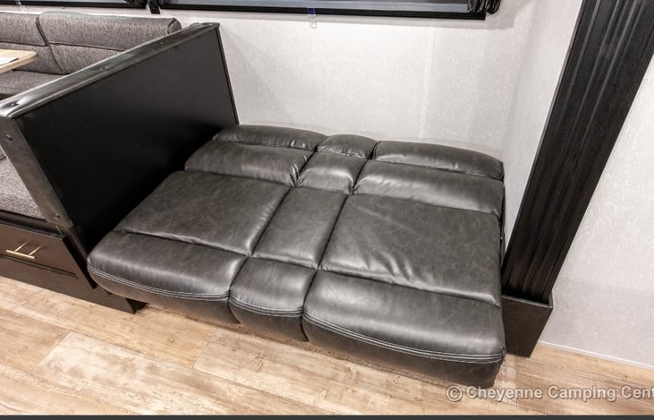 Love seats folds to a bed