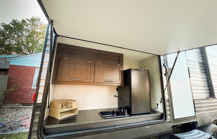 Outside Kitchen/sink/mini fridge