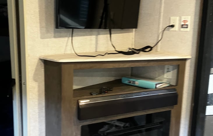 Family room tv is in a convenient spot for visibility from the couch.