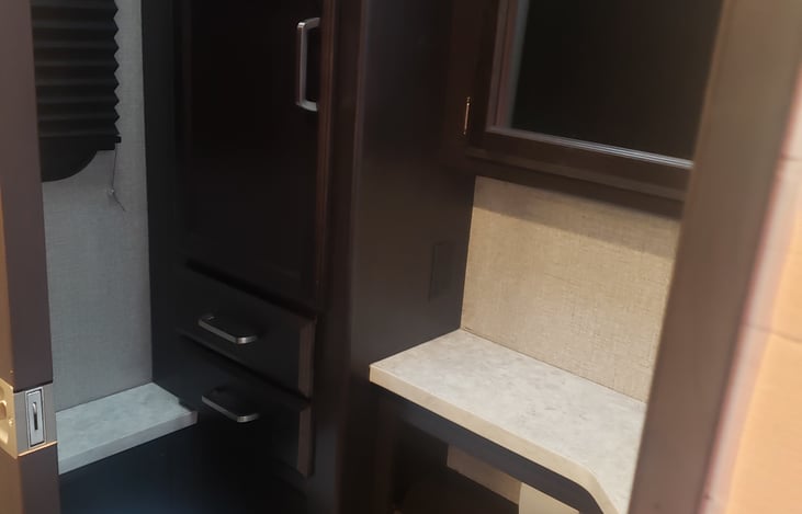 Lots of storage in bathroom.