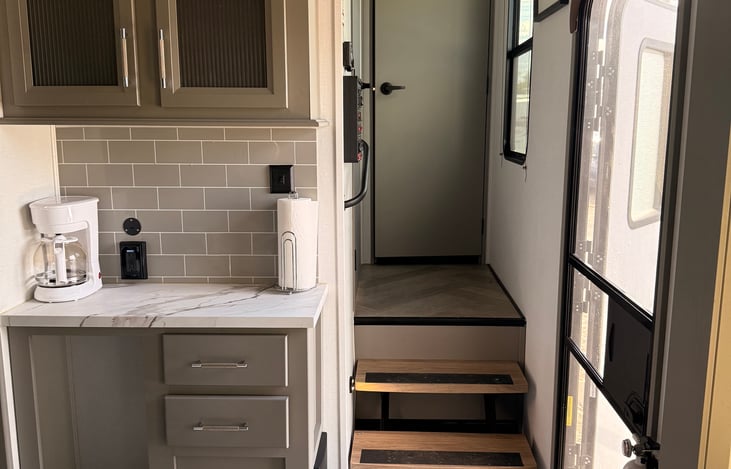 Hallway to master bedroom and bathroom