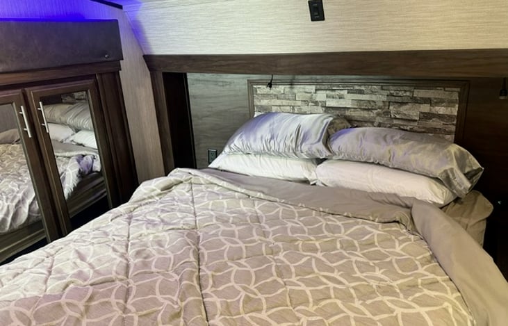 Upgraded to residential, queen-sized bed.