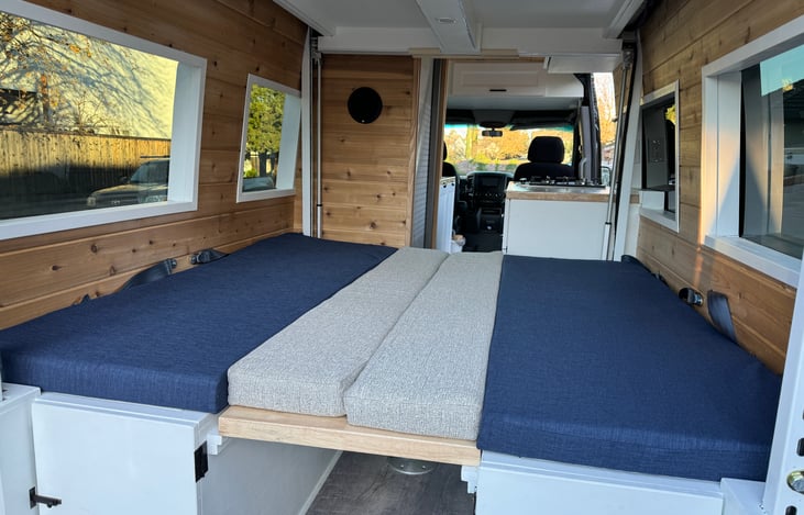 Lounge area can be converted into a sleeping area by connecting the benches to form a king sized mattress good for 2