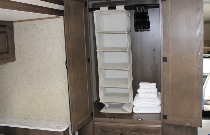 Added bedroom closet organizer, hangers included and set of towels inlcude.