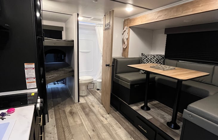 Dinette and bathroom door open
